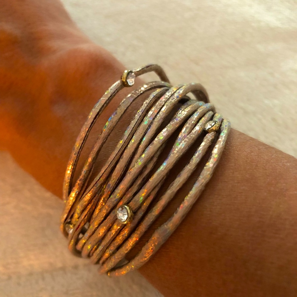 Multi strand bracelet with gold magnetic closure